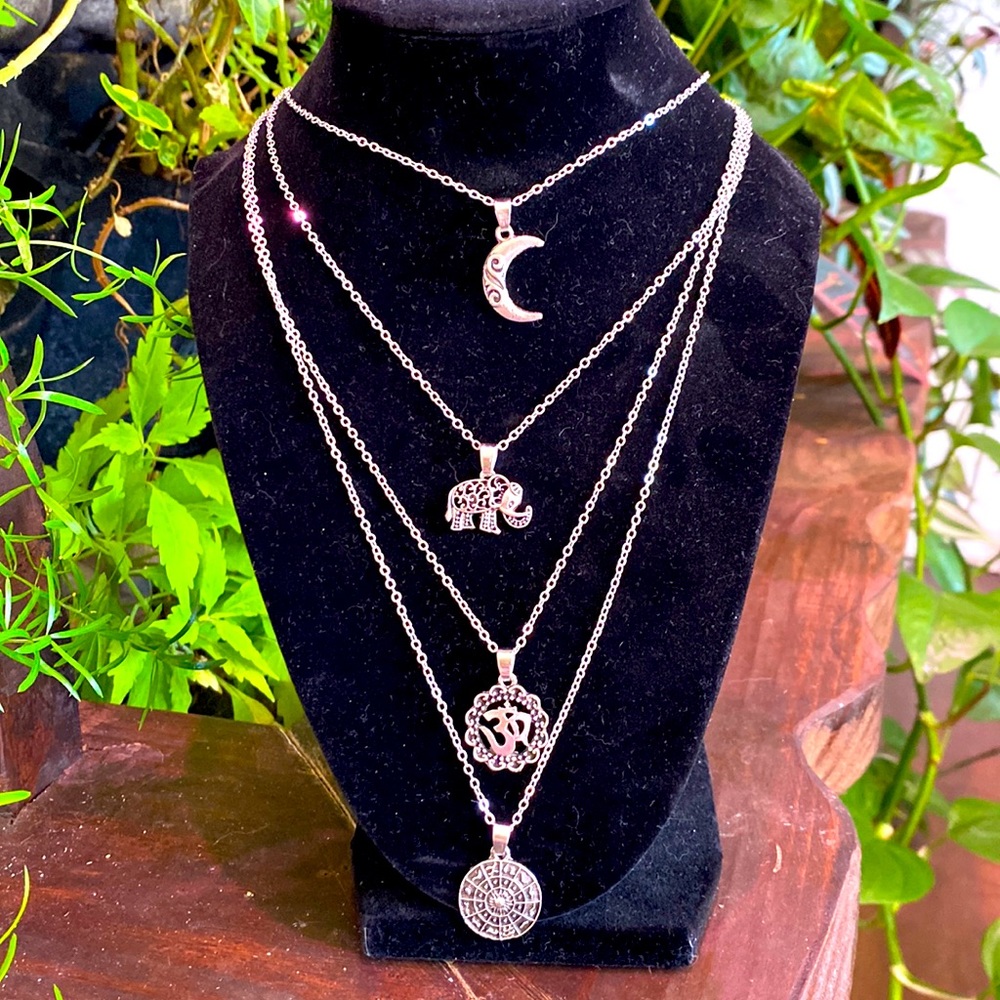 Silver charm necklace 4 strands